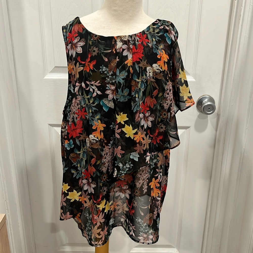 Forever 21 sheer floral top size small. Black background with multi colors.